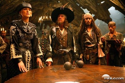Pictured L-R: Elizabeth Swan (KEIRA KNIGHTLEY), Captain Barbossa (Geoffrey Rush), Captain Jack Sparrow (Johnny Depp), and Ragetti (MAKENZIE CROOK) in a scene from PIRATES OF THE CARIBBEAN: AT WORLD'S END, directed by Gore Verbinski and produced by Jerry Bruckheimer, from a screenplay written by Ted Elliott & Terry Rossio. 