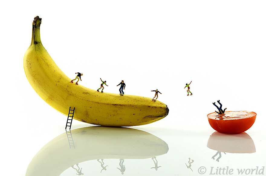 skating little people on yelllow banana