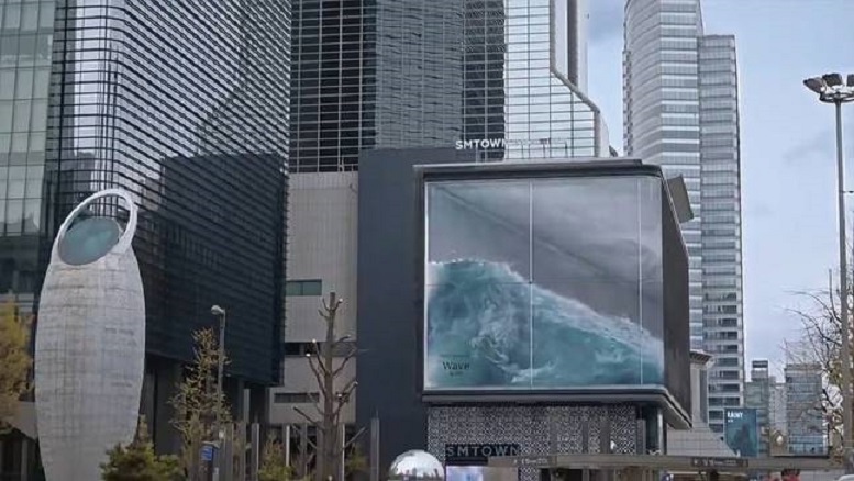 Outdoor gigante cria ilusão de onda batendo em prédio sul-coreano