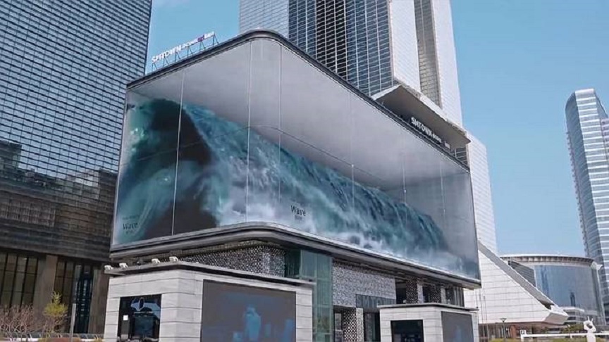 Outdoor gigante cria ilusão de onda batendo em prédio sul-coreano